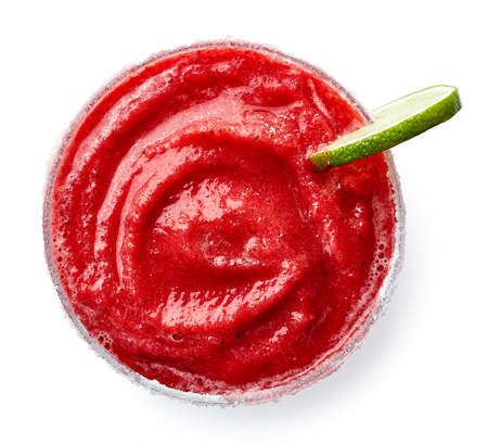 Glass of frozen strawberry Margarita cocktail isolated on white background. Top viewの写真素材