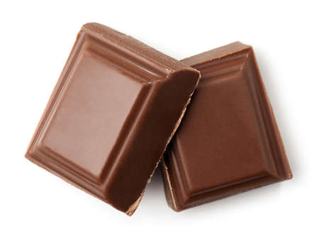 Two pieces of milk chocolate isolated on white background. Top viewの写真素材