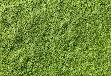 Background of green matcha tea powderの写真素材