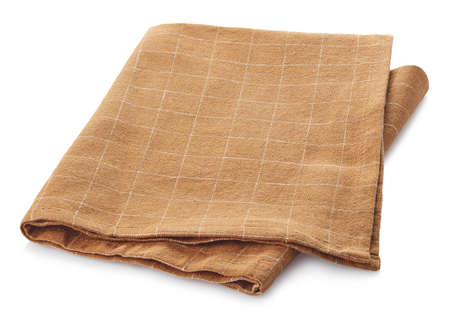 Folded light brown checkered cotton napkin isolated on white backgroundの写真素材