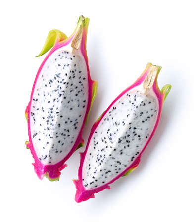 Two pieces of fresh sliced dragon fruit or pitahaya (pitaya) isolated on white background, top viewの写真素材