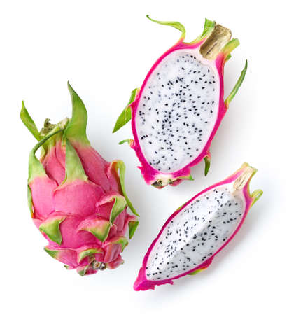 Fresh whole, half and sliced dragon fruit or pitahaya (pitaya) isolated on white background, top viewの写真素材