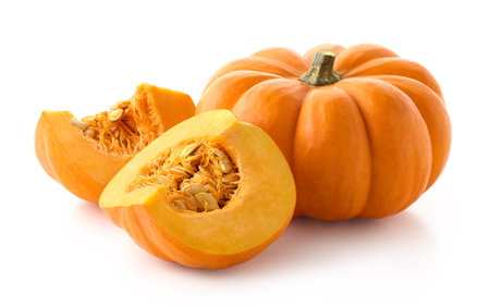 Fresh whole and sliced pumpkin isolated on white backgroundの写真素材
