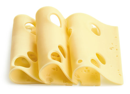 Maasdam cheese slices isolated on white backgroundの写真素材