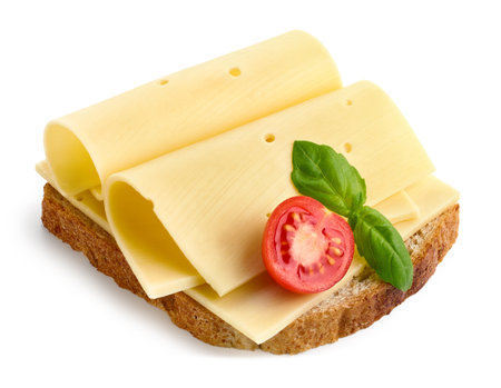 Toast sandwich with cheese slices and cherry tomato isolated on white backgroundの写真素材