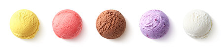 Set of five various ice cream scoops or balls isolated on white background. Top view. Vanilla, strawberry, chocolate, mango and blueberry flavorの写真素材