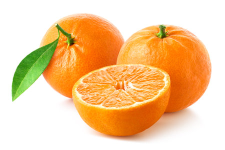 Fresh ripe whole and half of tangerine, mandarin or clementine with green leaf isolated on white background, citrus fruitsの写真素材