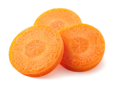 Three fresh carrot slices isolated on white backgroundの写真素材