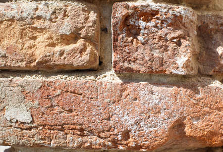 Old red brick wall. close-up.の写真素材