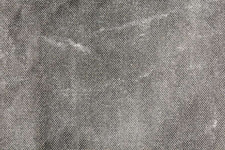 Close-up background of grey fabric or abstract black fabric texture. Black background.の写真素材