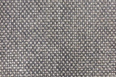 Close-up background of grey fabric or abstract black fabric texture. Black background.