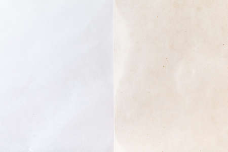 Sheet of white thin parchments background top view. Wrinkled wrapping paper texture or pattern.