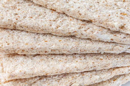Dietary dry bread sticks. Diet and health food and snack. Isolated on white background.
