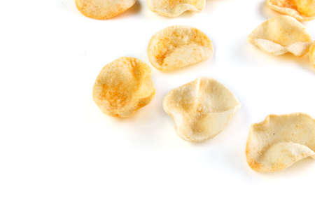 Potatoes snack with pepper on isolated white background. Close-up