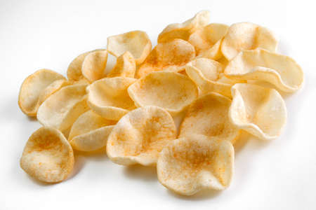 Potatoes snack with pepper on isolated white background. Close-upの写真素材