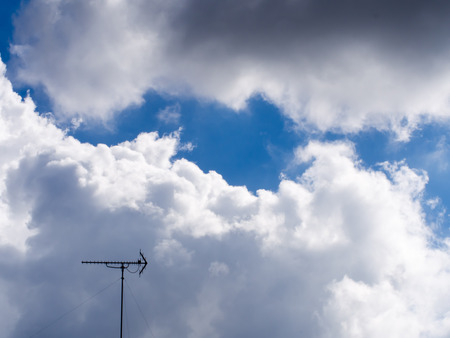 clouds with TV antennasの写真素材