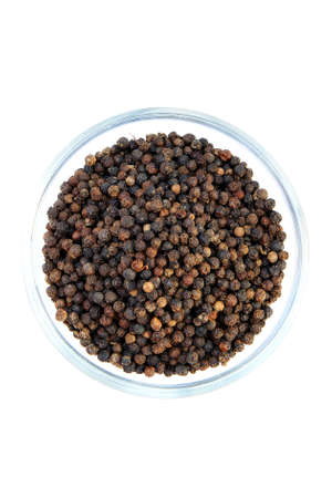 Black peppercorns in glass bowl  Black pepper ballsの写真素材