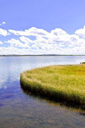 Clouds in the sky & lake sceneryの写真素材