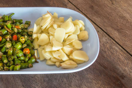 Sliced   8203;  8203;chilli and garlic in the dish の写真素材