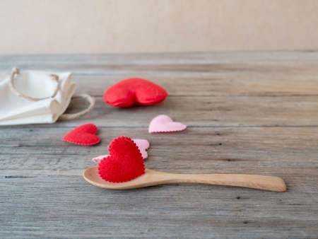 Red heart on wooden ladle,の写真素材