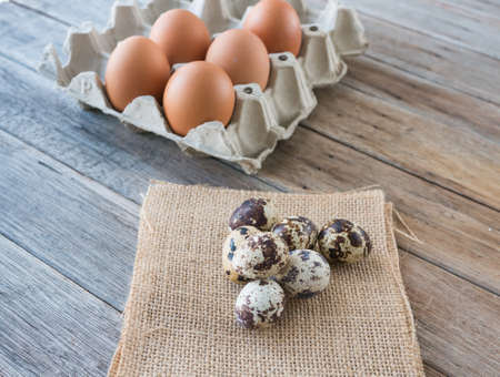Quail eggs on sack, blur eggs background,