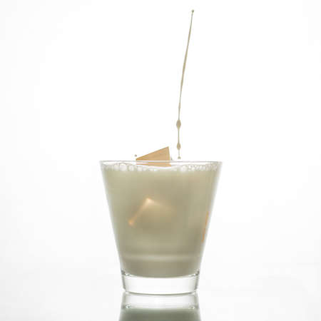 Milk in glass on white background,の写真素材