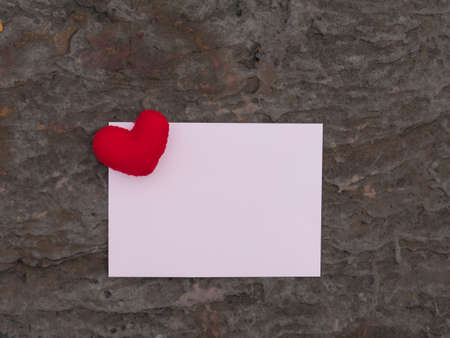 Red heart and paper card on rock retro background,