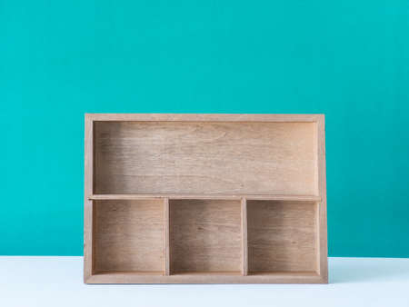 Wooden box on green background,の写真素材