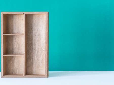 Wooden box on green background,の写真素材