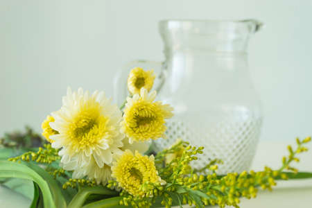 Yellow pollen of white flower on blurred jug glass background,の写真素材