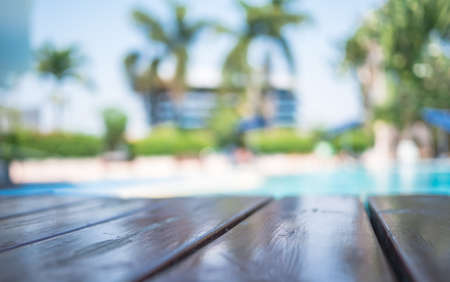 Blur wooden table on pool background, selection focus shameless wooden table,の写真素材