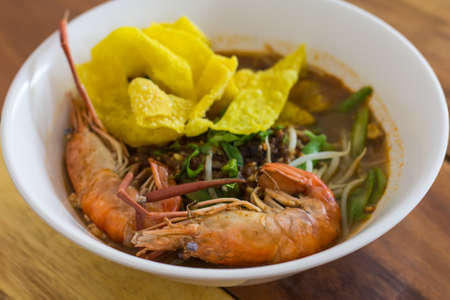 shrimp in noodle on white cup,