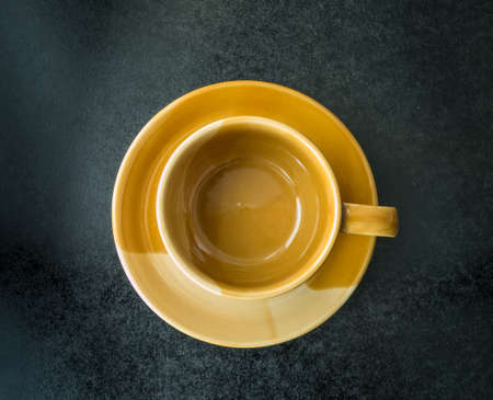 Empty cup on black background,の写真素材
