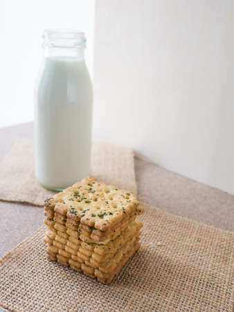 Cookie on blur milk in bottle background,の写真素材