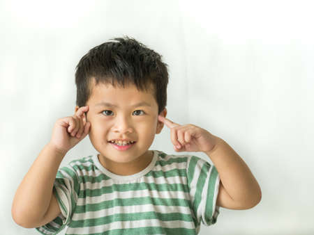 Children pretend to think and smile on white background,の写真素材