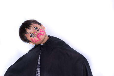Little asian cute boy wear Halloween on white background,