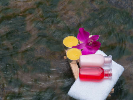 Spa products on light wooden background, white soap on wooden table, spa on water background,の写真素材