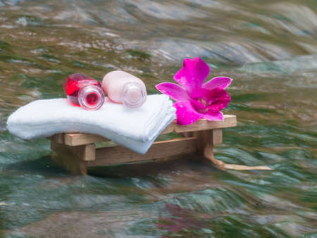 Spa products on light wooden background, white soap on wooden table, spa on water background,の写真素材