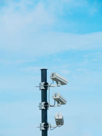 closed-circuit camera on white clouds background,の写真素材