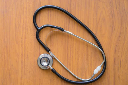 Heart meter on wooden table,の写真素材