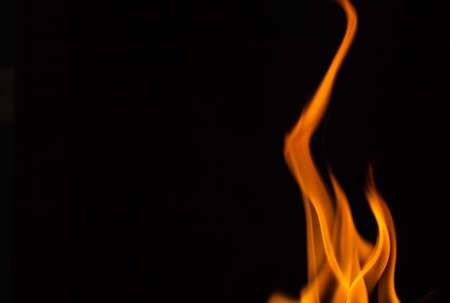 Beautiful fire flames, isolated on black background,