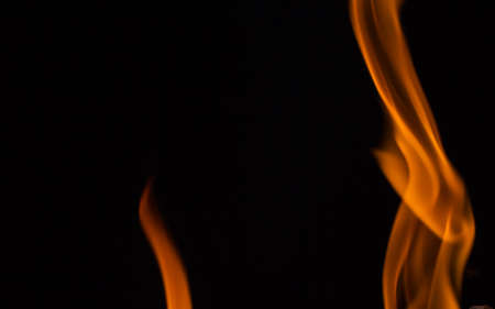 Beautiful fire flames, isolated on black background,