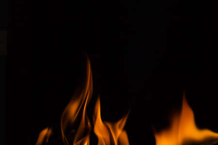 Beautiful fire flames, isolated on black background,の写真素材
