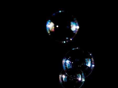 soap bubbles on black background, Photo of soap bubble,
