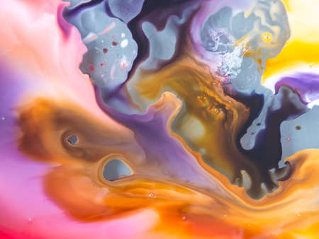 Abstract background, various pigments and dyes create a rich texture, blurred color background,