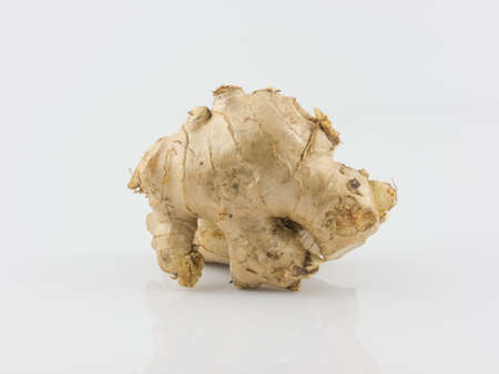 Raw ginger on white background,