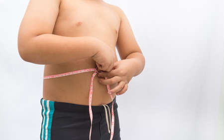 Belly kid and Waist measurement on white background,の写真素材