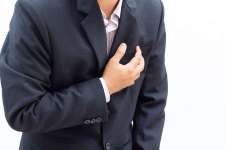 Business man catch the heart on white background,