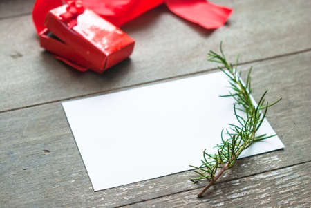 Card for someone special decorated with rosemary on wood