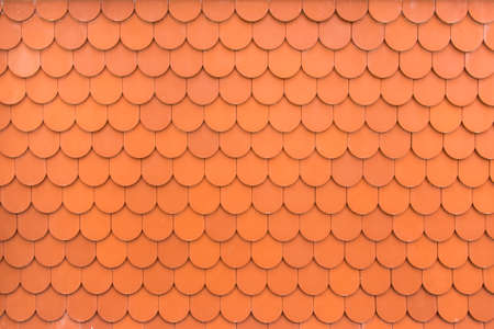 Pattern of orange terracotta roof tilesの写真素材
